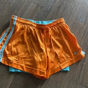 NIKE orange and blue dri- fit shorts